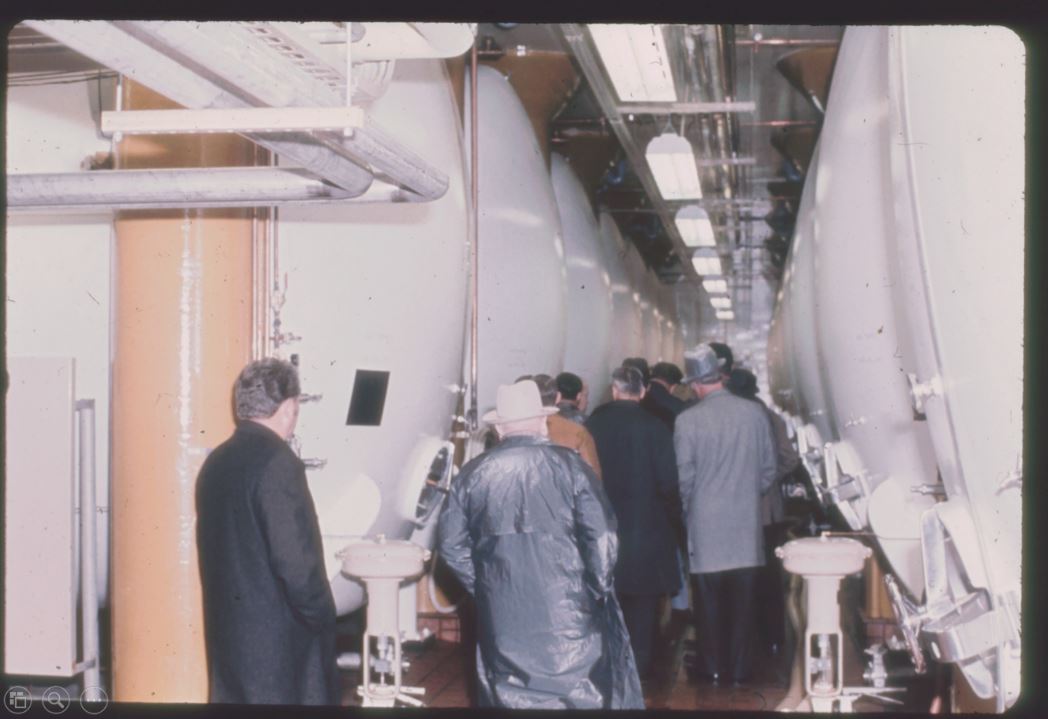 A photo from the Montana Wheat and Barley Committee at work in the 1960s and 1970s.