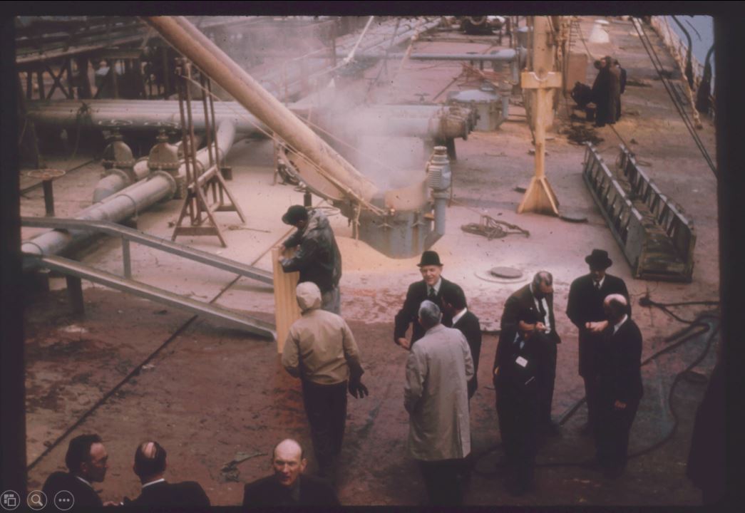 A photo from the Montana Wheat and Barley Committee at work in the 1960s and 1970s.
