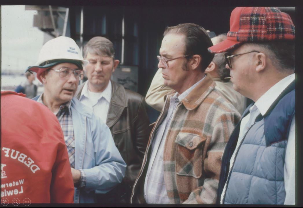 A photo from the Montana Wheat and Barley Committee at work in the 1980s.