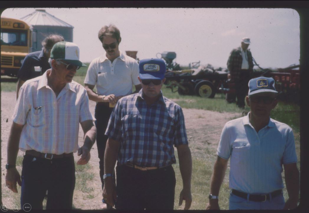 A photo from the Montana Wheat and Barley Committee at work in the 1980s.