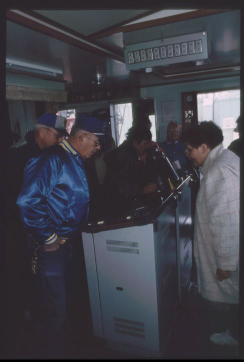 A photo from the Montana Wheat and Barley Committee at work in the 1990s.