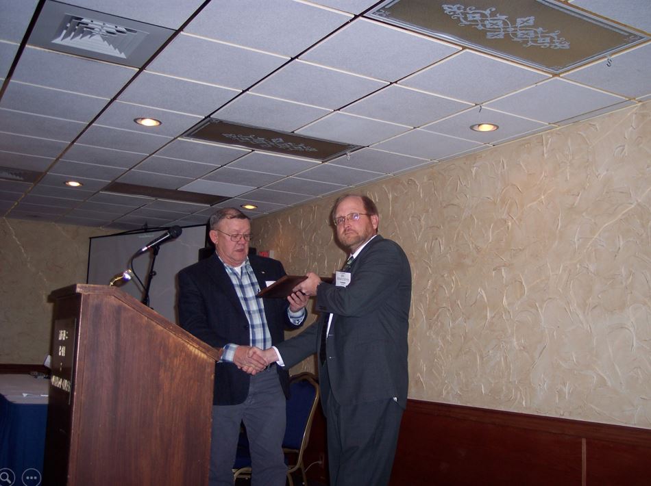 A photo from the Montana Wheat and Barley Committee at work in the 2000s (the oughts).