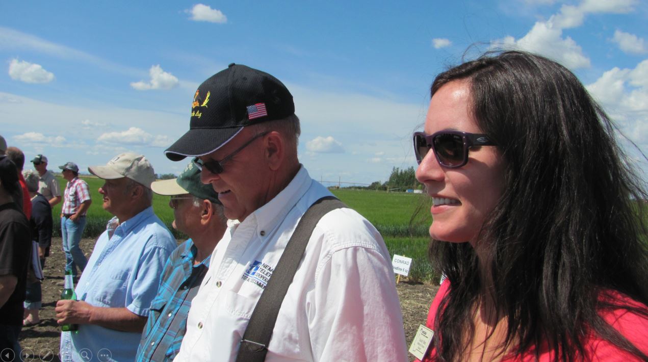 A photo from the Montana Wheat and Barley Committee at work in the 2000s (the oughts).