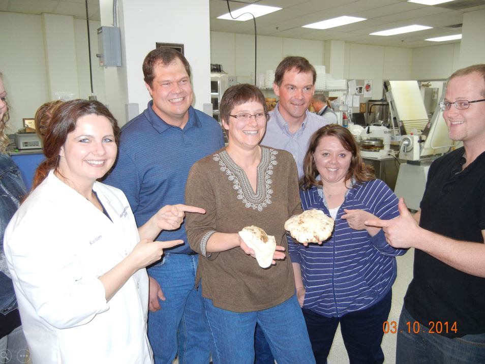 A photo from the Montana Wheat and Barley Committee at work in the 2010s.