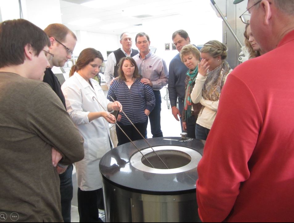 A photo from the Montana Wheat and Barley Committee at work in the 2010s.