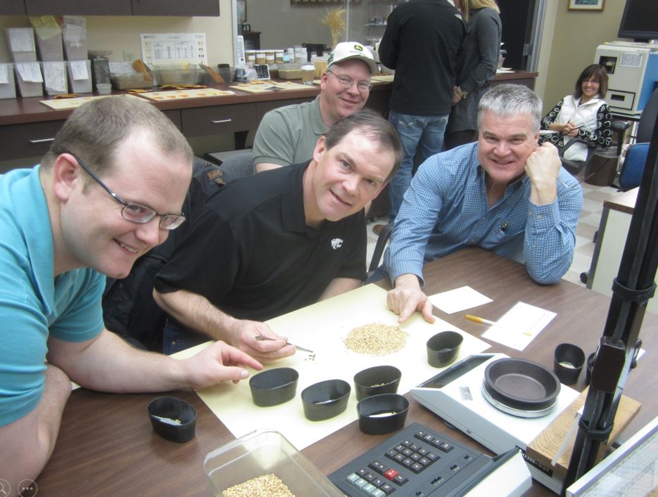 A photo from the Montana Wheat and Barley Committee at work in the 2010s.