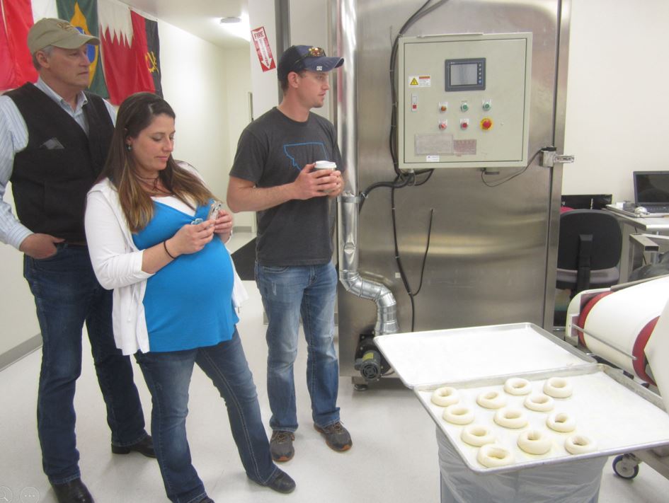 A photo from the Montana Wheat and Barley Committee at work in the 2010s.